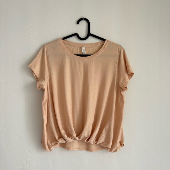 Lululemon Pleats and Thank You Short Sleeve in Ivory Peach
Size 6 - Picture 5 of 9